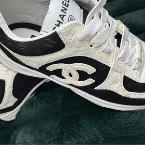 CHANEL Women's Black and White Sneakers